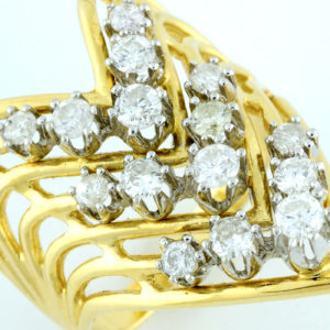 Anillo en Oro Amarillo con 15 Diamantes Naturales talla Brillante de 1,00 ct. total aprox. (G-H-I/SI1-SI2).