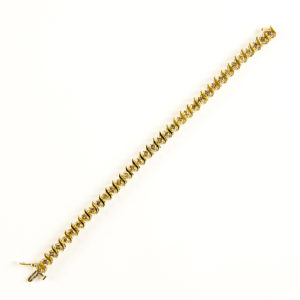 Brazalete Riviere, en Oro con 35 Diamantes talla Brillante de 4,55 ct. (CERTIFICADO IGE).