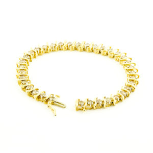 Brazalete Riviere, en Oro con 35 Diamantes talla Brillante de 4,55 ct. (CERTIFICADO IGE).