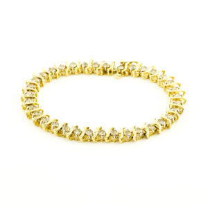 Brazalete Riviere, en Oro con 35 Diamantes talla Brillante de 4,55 ct. (CERTIFICADO IGE).