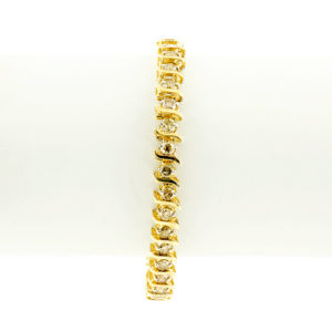 Brazalete Riviere, en Oro con 35 Diamantes talla Brillante de 4,55 ct. (CERTIFICADO IGE).