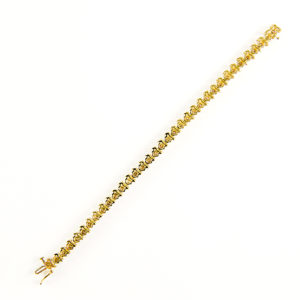 Brazalete Riviere, en Oro con 35 Diamantes talla Brillante de 4,55 ct. (CERTIFICADO IGE).