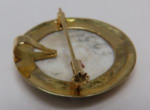 Broche de porcelana francesa, representando a Napoleón. Oro 18k.