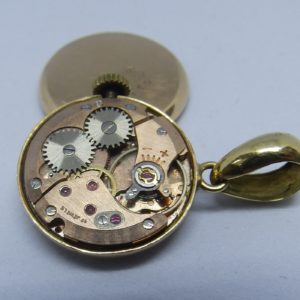 Cadena de Oro 18k. con Reloj Suizo de colgar, Radiant INCABLOC, lepine y remontoir. Pps. siglo XX.