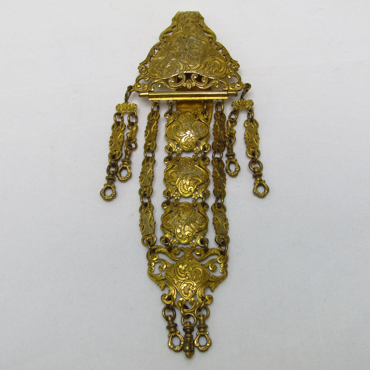 Chatelaine Antiguo en metal dorado. Siglo XIX