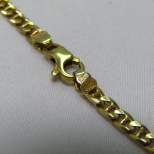 Collar Barbado en Oro de 18k con Cruz Latina en Oro y Marfil.