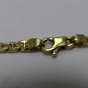 Collar Barbado en Oro de 18k con Cruz Latina en Oro y Marfil.