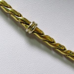 Collar de Oro Bicolor de 18k. con eslabones articulados y cierre reasón Marinero.