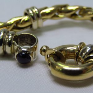 Collar de Oro Bicolor de 18k. con eslabones articulados y cierre reasón Marinero.