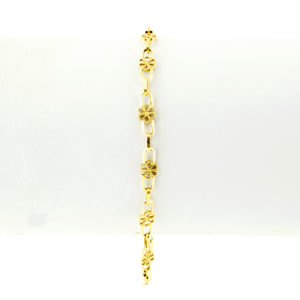 Conjunto de collar y pulsera en oro de 18k. Con eslabones calados.