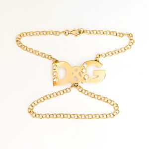 D&G. Pulsera mano-dedo en Oro de 18k. y circonitas.