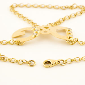 D&G. Pulsera mano-dedo en Oro de 18k. y circonitas.