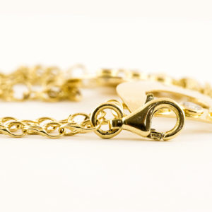 D&G. Pulsera mano-dedo en Oro de 18k. y circonitas.