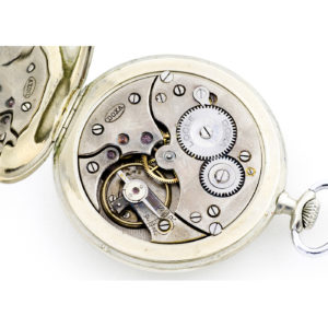 Doxa. Reloj de bolsillo, lepine y remontoir. Automatón. Pps. siglo XX.