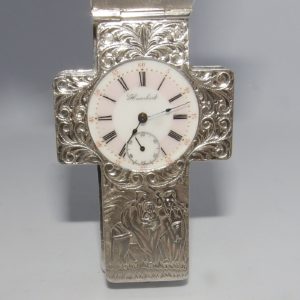 Ernest Humbert. Reloj pectoral en forma de cruz, Plata de Ley, Hecho a mano. Locle, Suiza, ca. 1880.