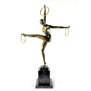 ESCULTURA DE BRONCE DE BAILARINA CON AROS.