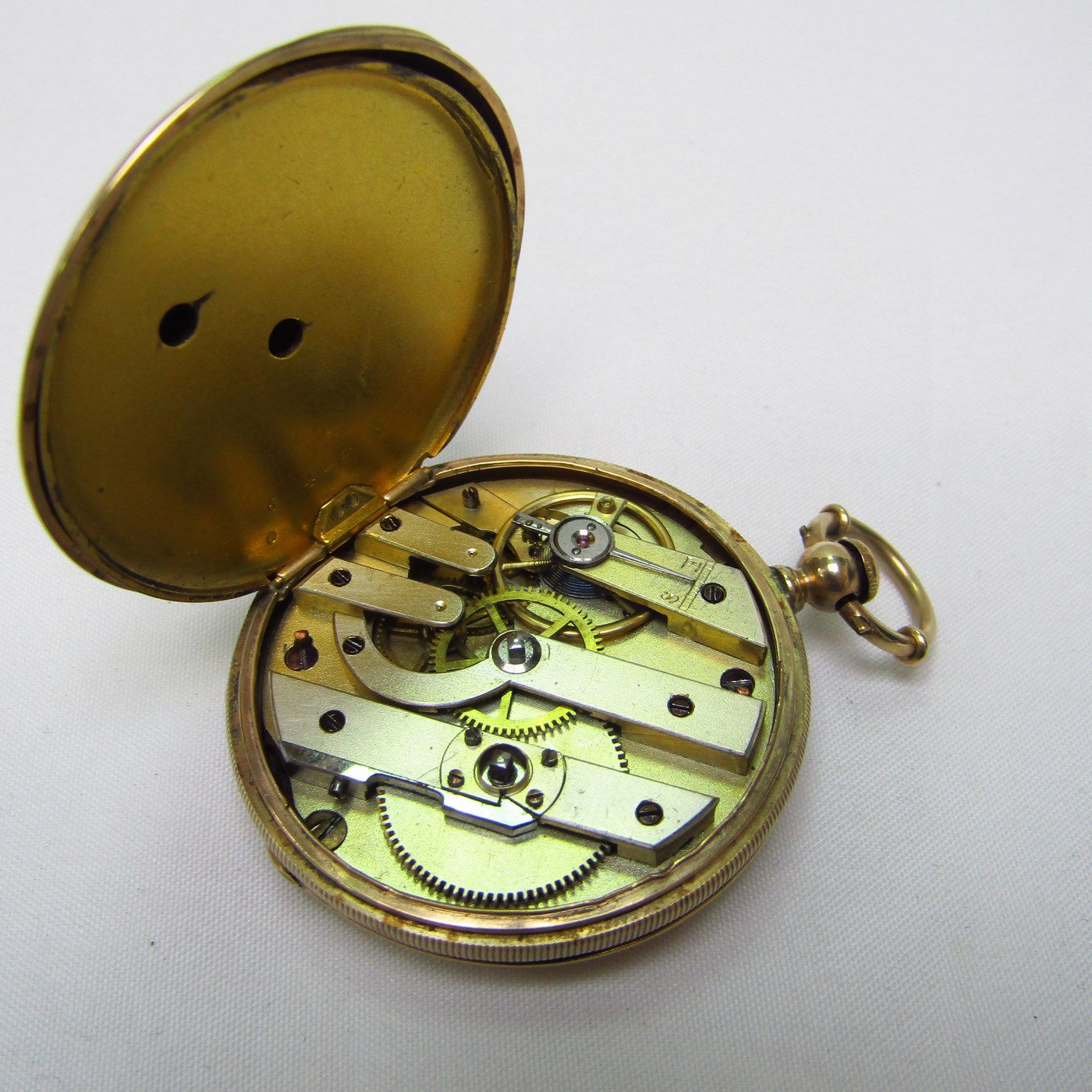 F. HUGUENIN. Reloj de colgar saboneta. Suiza, ca. 1900. F. HUGUENIN. Reloj de colgar saboneta. Suiza, ca. 1900.
