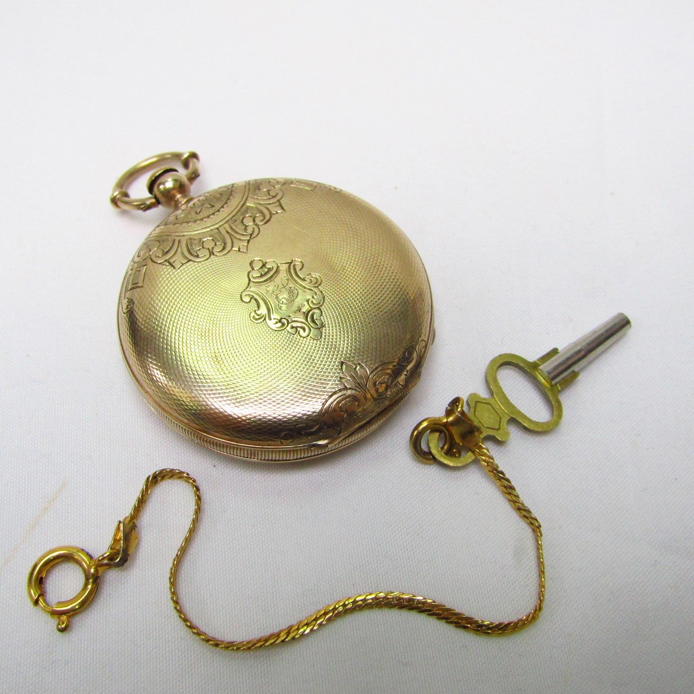 F. HUGUENIN. Reloj de colgar saboneta. Suiza, ca. 1900. F. HUGUENIN. Reloj de colgar saboneta. Suiza, ca. 1900.