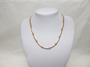 Gargantilla en Oro de 18k. con circonitas.