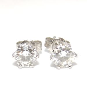 Juego de pendientes dormilona, en Platino (900), con Dos Diamantes Naturales talla Brillante, de 0,69 ct. Total (H/SI2).