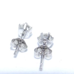 Juego de pendientes dormilona, en Platino (900), con Dos Diamantes Naturales talla Brillante, de 0,69 ct. Total (H/SI2).