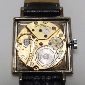 JULES JURGENSEN. Reloj de pulsera unisex. Ca. 1960