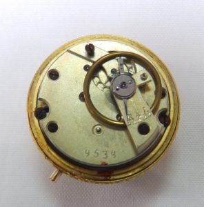 Leontina y Reloj de Bolsillo para dama en Oro de 18k. Ca.