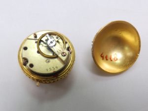 Leontina y Reloj de Bolsillo para dama en Oro de 18k. Ca.