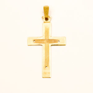 Lote de cuatro crucifijos para colgar en oro de 18k. España. Siglo XX.