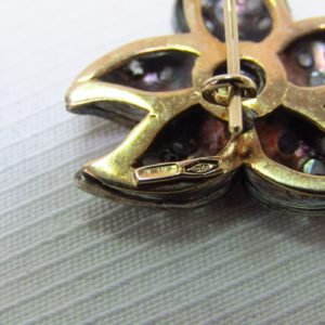 Pareja de Pendientes antiguos en Oro de 9k con rubí central y diamantes.
