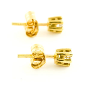 Pareja de pendientes dormilona. Oro y Diamantes talla Brillante.