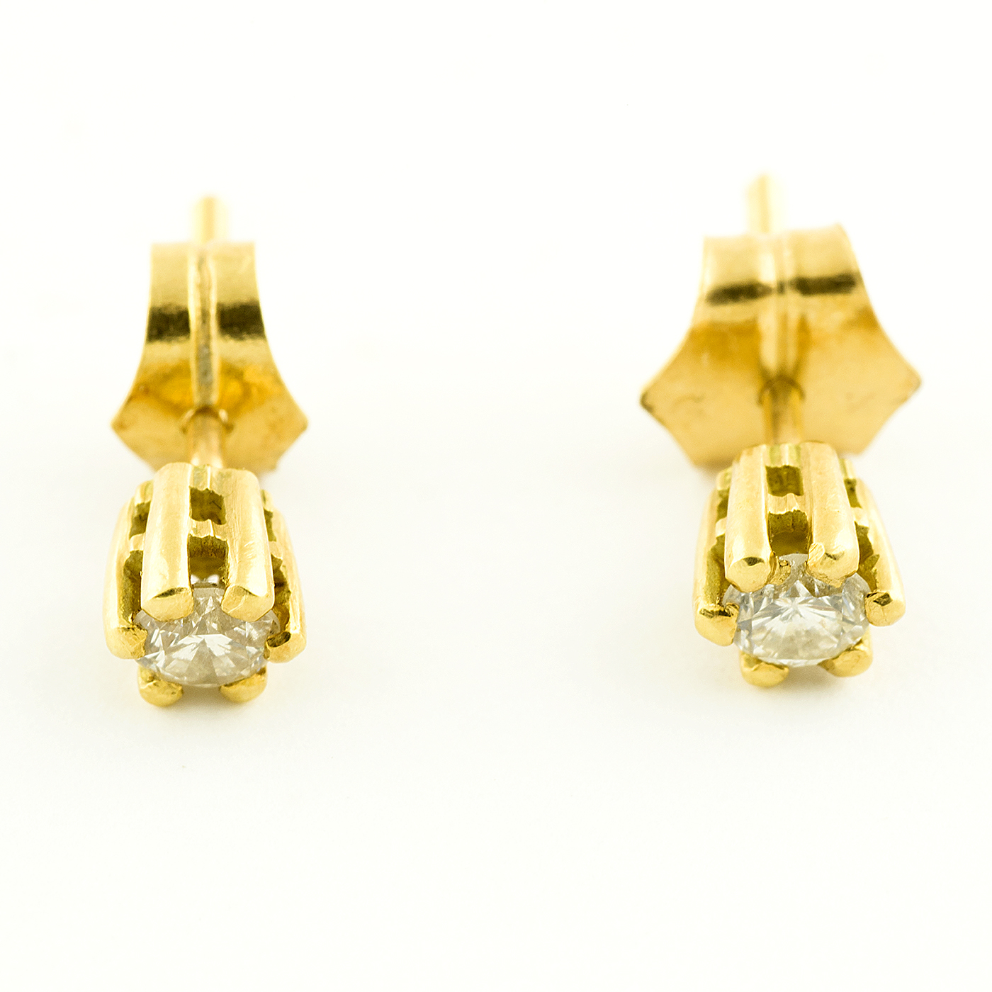 Pareja de pendientes dormilona. Oro y Diamantes talla Brillante. Pareja de pendientes dormilona. Oro y Diamantes talla Brillante.