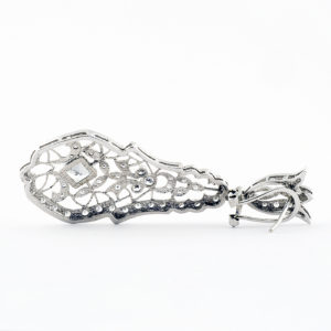 Pareja de pendientes largos de dos cuerpos, articulados, en Oro Blanco y circonitas.