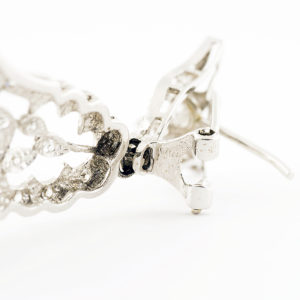 Pareja de pendientes largos de dos cuerpos, articulados, en Oro Blanco y circonitas.