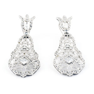 Pareja de pendientes largos de dos cuerpos, articulados, en Oro Blanco y circonitas.