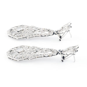 Pareja de pendientes largos de dos cuerpos, articulados, en Oro Blanco y circonitas.