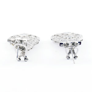 Pareja de pendientes largos de dos cuerpos, articulados, en Oro Blanco y circonitas.