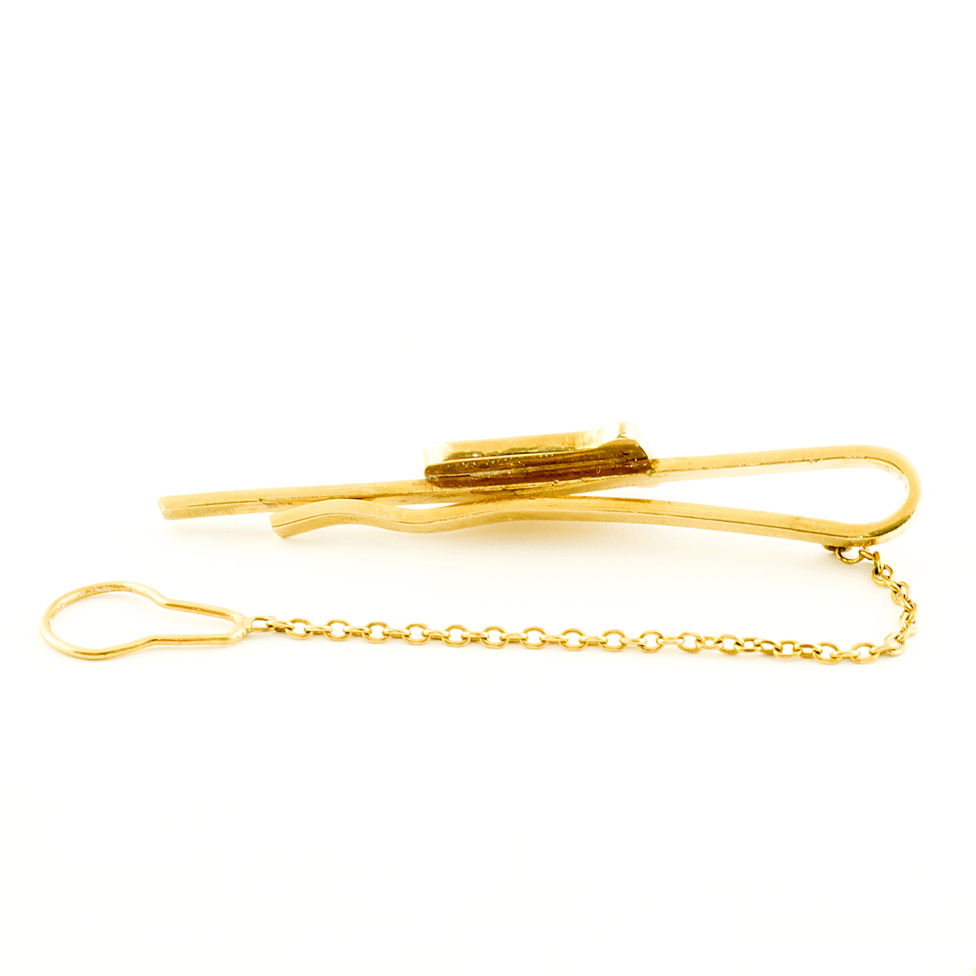 Pisacorbarta en oro y esmalte, con la bandera de España preconstitucional. Siglo XX. Pisacorbarta en oro y esmalte, con la bandera de España preconstitucional. Siglo XX.