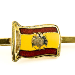 Pisacorbarta en oro y esmalte, con la bandera de España preconstitucional. Siglo XX.