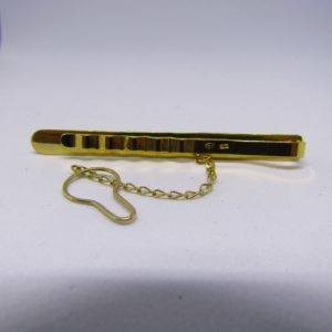 Pisacorbata en Oro de 18k, liso y matizado.