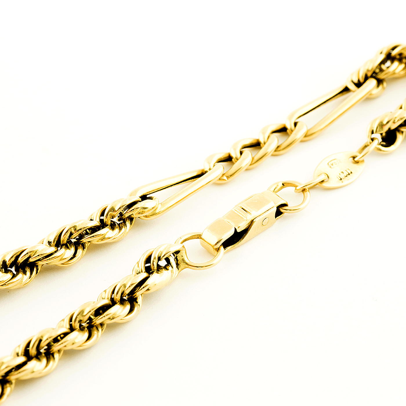 Pulsera Combinada, cordón y eslabones, en Oro de 18k. Pulsera Combinada, cordón y eslabones, en Oro de 18k.