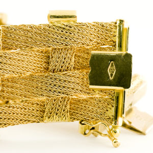 Pulsera de Oro con malla entrelazada. 18k.