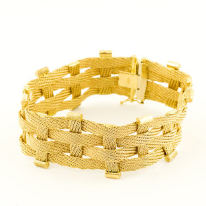 Pulsera de Oro con malla entrelazada. 18k.