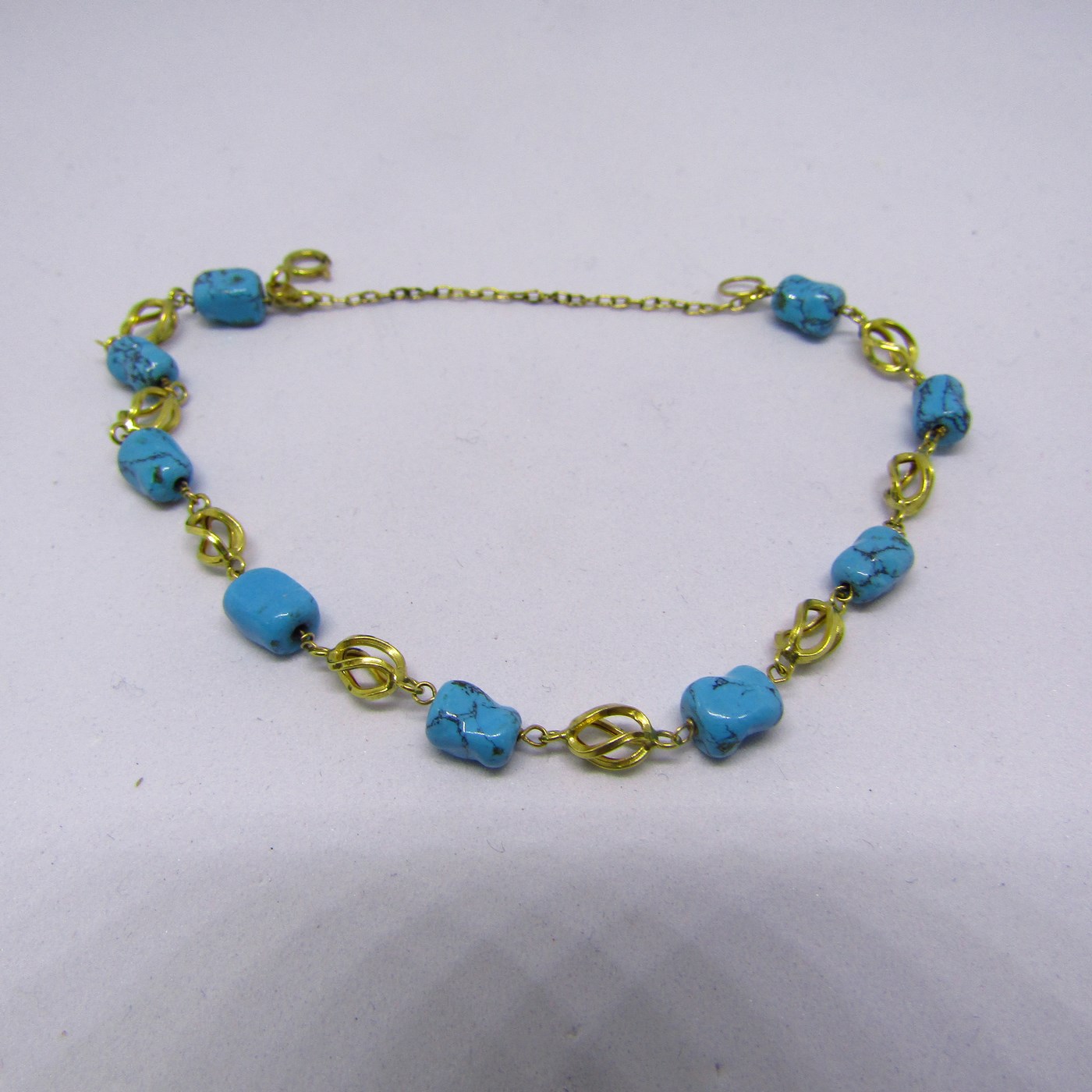 Pulsera de Oro de 18k con 9 turquesas Arizona. 4,50 gr. Pulsera de Oro de 18k con 9 turquesas Arizona. 4,50 gr.