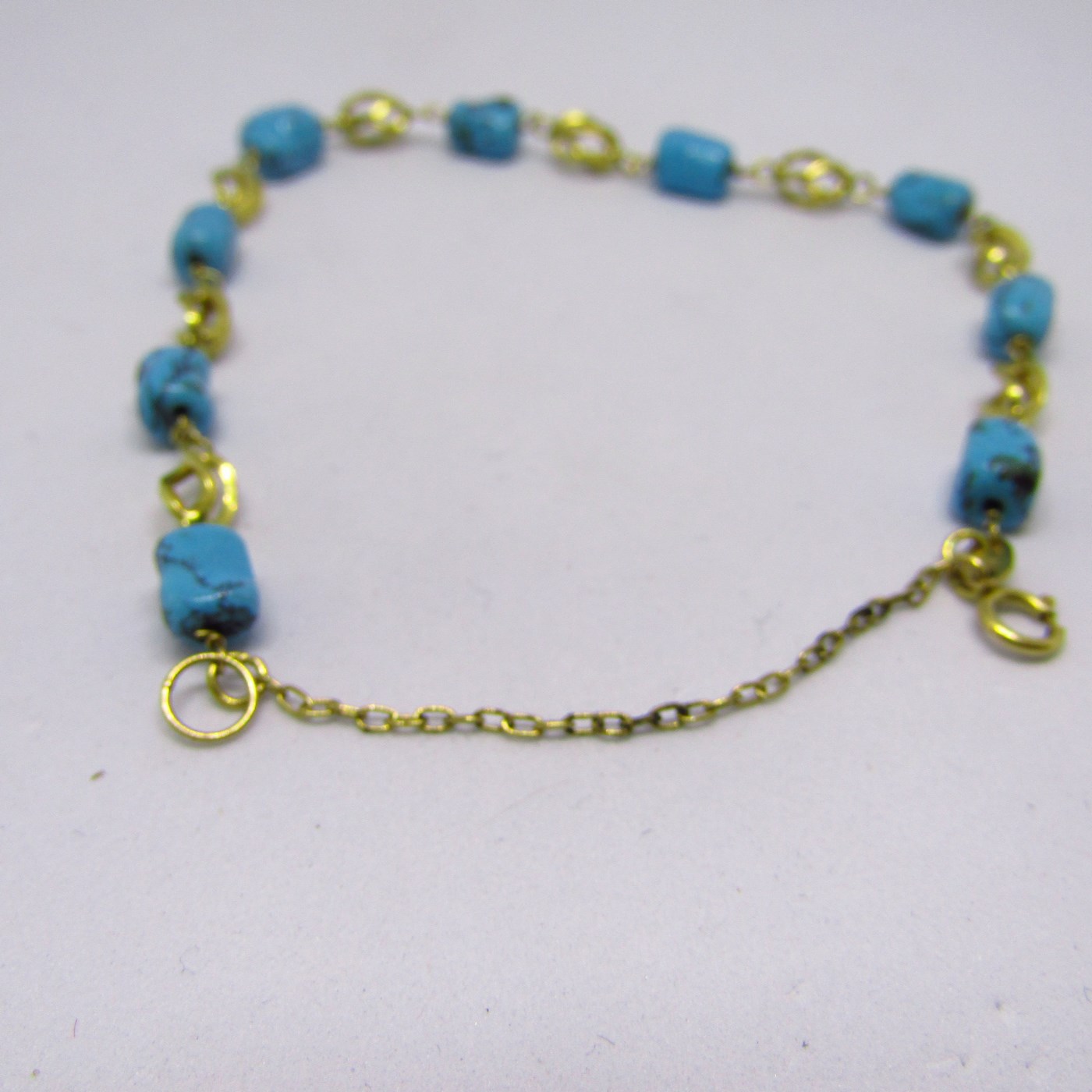 Pulsera de Oro de 18k con 9 turquesas Arizona. 4,50 gr. Pulsera de Oro de 18k con 9 turquesas Arizona. 4,50 gr.