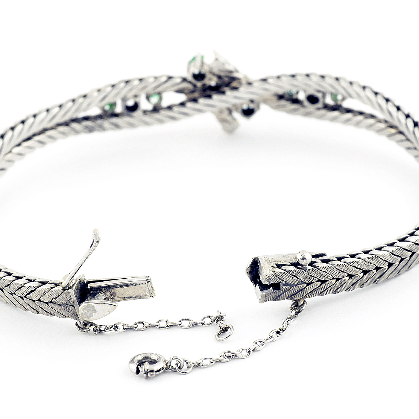 Pulsera en Oro Blanco con Cuatro Diamantes y Seis Esmeraldas. Pulsera en Oro Blanco con Cuatro Diamantes y Seis Esmeraldas.