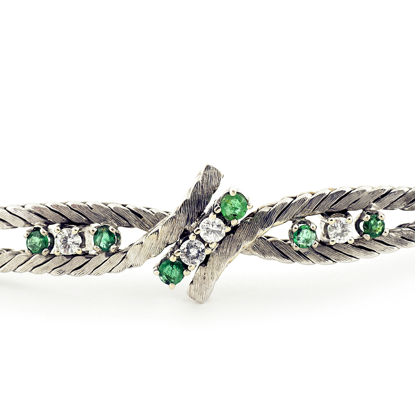Pulsera en Oro Blanco con Cuatro Diamantes y Seis Esmeraldas. Pulsera en Oro Blanco con Cuatro Diamantes y Seis Esmeraldas.