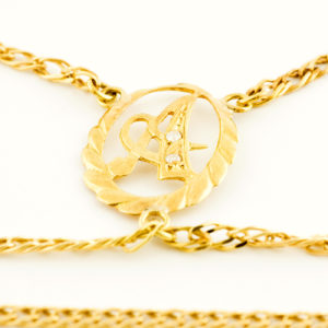 Pulsera mano-dedo en Oro de 18k. y circonitas.