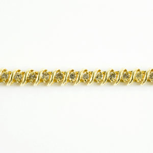 Pulsera Riviere, en Oro con 44 Diamantes talla Brillante de 2,42 ct. Color,L-M. Pureza:SI1-SI2