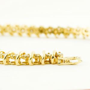 Pulsera Riviere, en Oro con 44 Diamantes talla Brillante de 2,42 ct. Color,L-M. Pureza:SI1-SI2